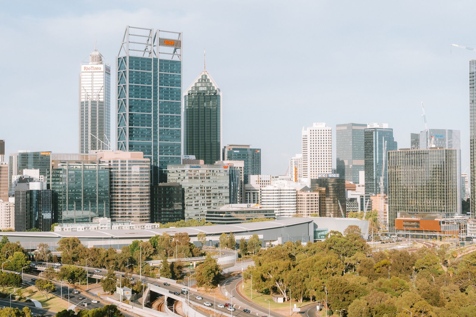 A vibrant view of Perth's skyline with modern skyscrapers and urban landscape.